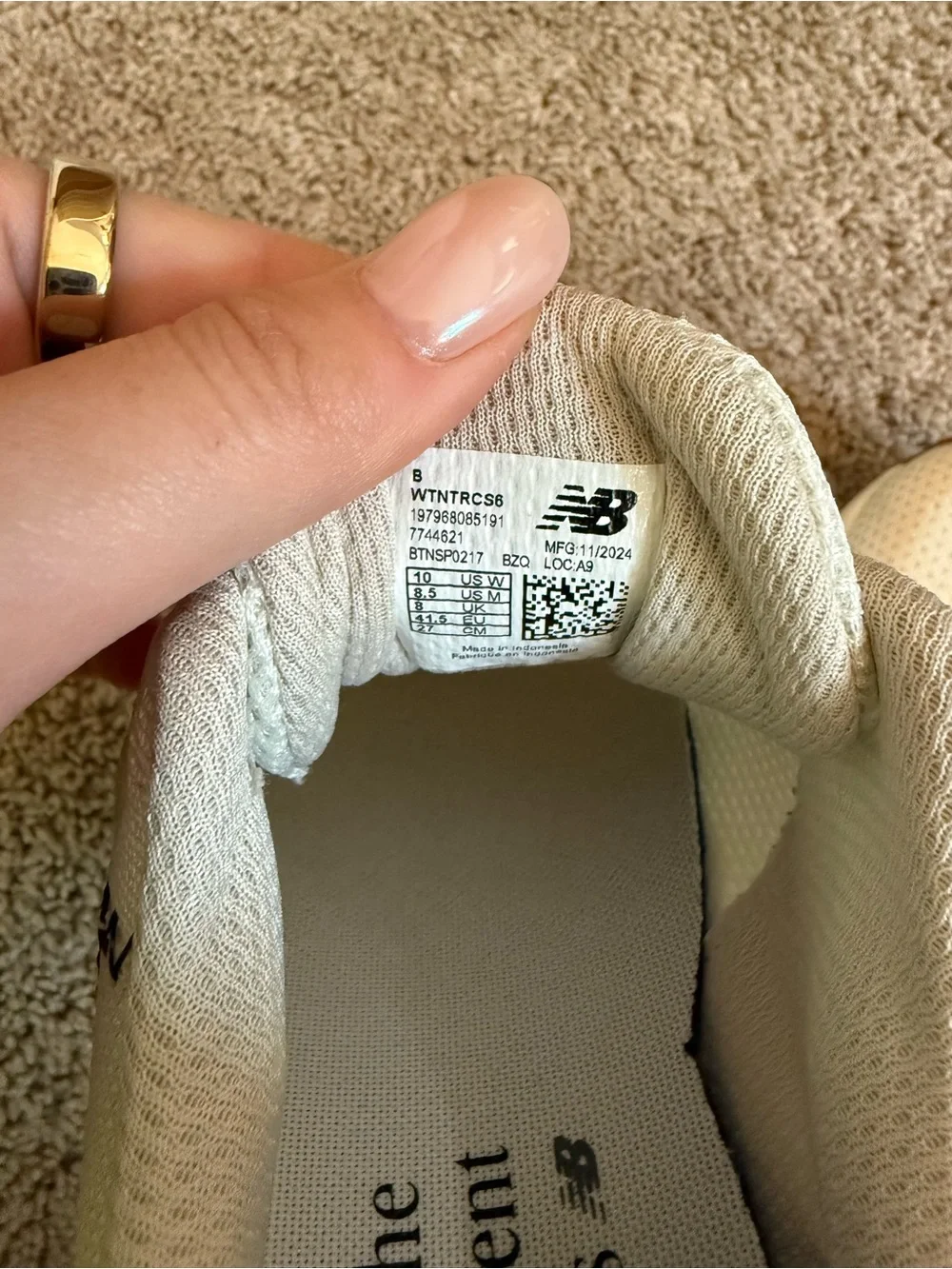 New Balance Women's Cream Athletic Sneakers with Pink Accents